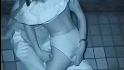 Naked mature lady under the gun of a hidden camera